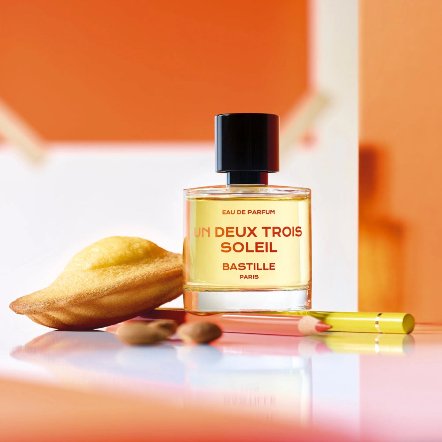 Un Deux trois Soleil Eau De Parfum fra Bastille Paris på orange baggrund