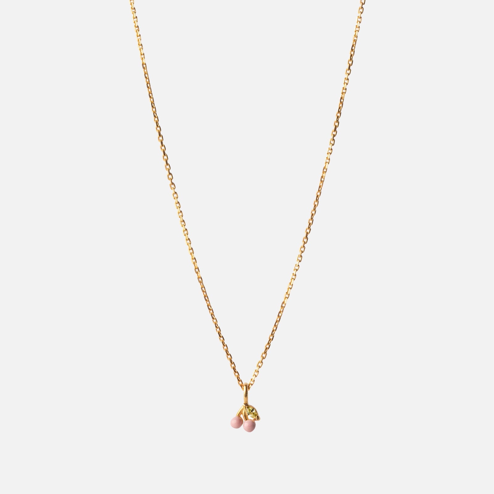 Cherry Necklace fra Enamel Copenhagen med lyserøde kirsebær